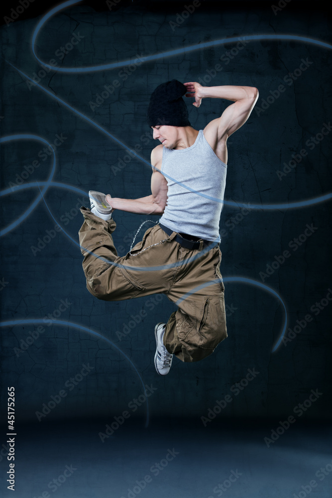 Young hip-hop dancer jumping