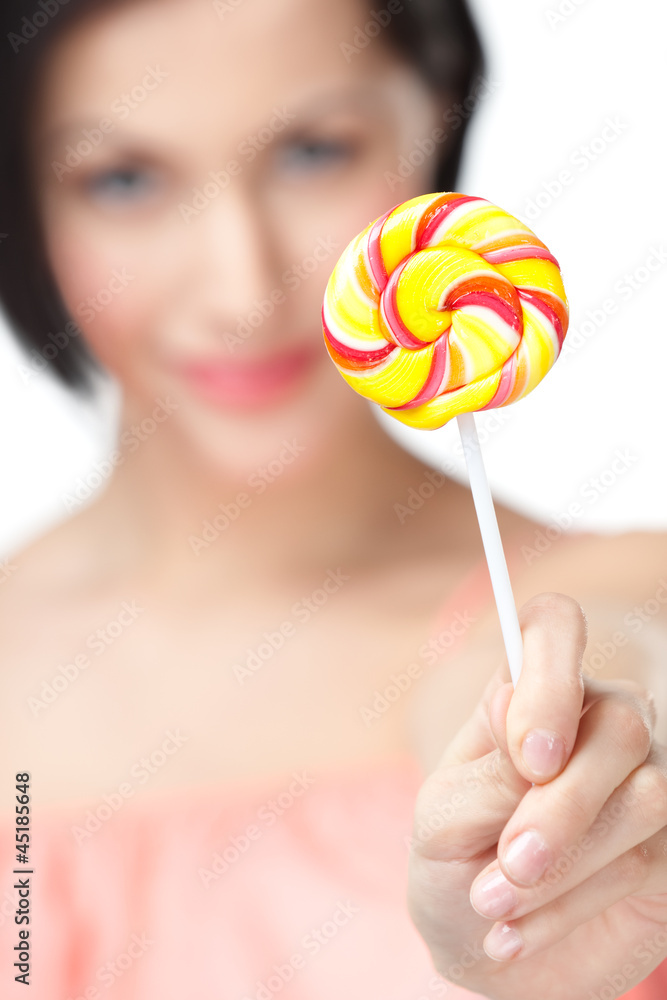 Woman offers lollypop, isolated on white Woman offers lollypop, isolated on white