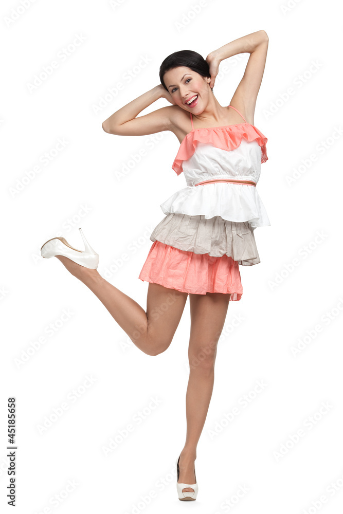 Dancing woman in colored dress, isolated on white Dancing woman in colored dress, isolated on white