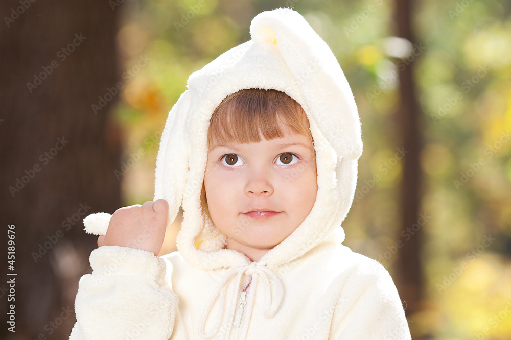beautiful little girl in costume bunny in the autumn forest beautiful little girl in costume bunny in the autumn forest