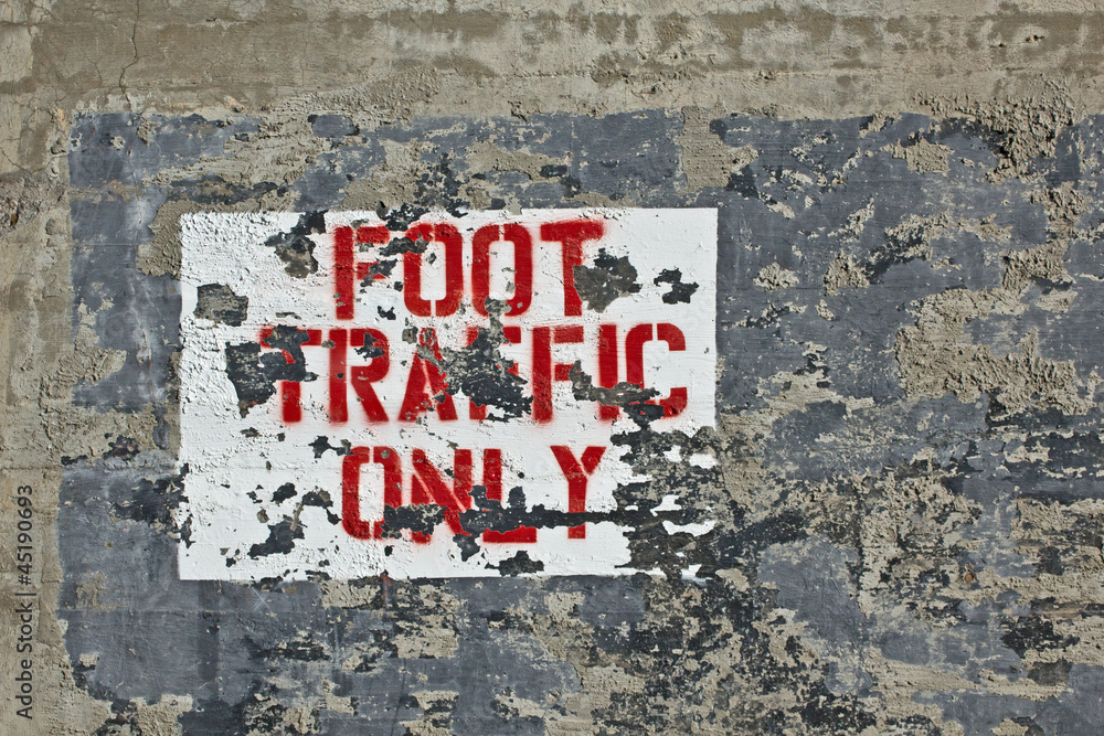 Grunge painted sign on concrete foot traffic only Grunge painted sign on concrete foot traffic only