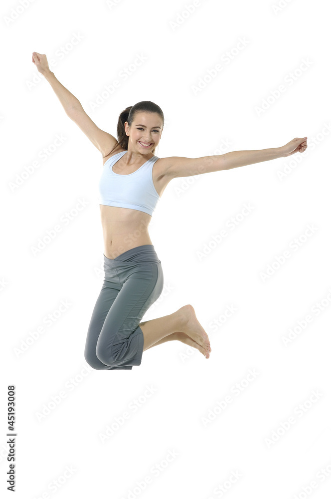 Young girl in sportwear jumping