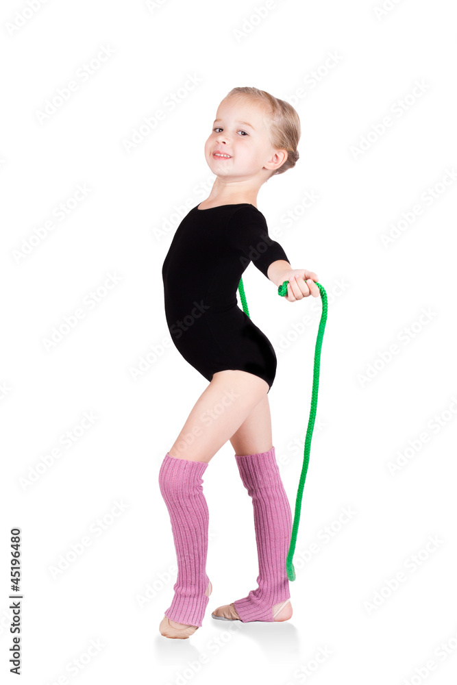 Adorable little gymnast isolated on white background Adorable little gymnast isolated on white background
