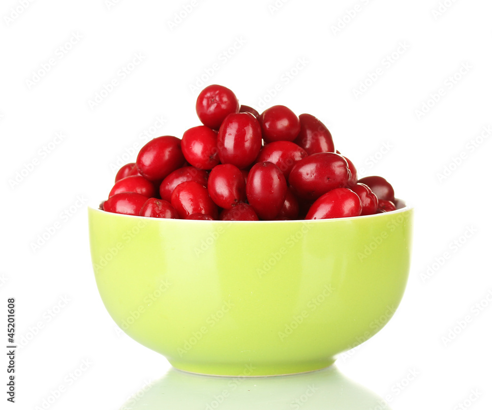 fresh cornel berries in bowl isolated on white fresh cornel berries in bowl isolated on white