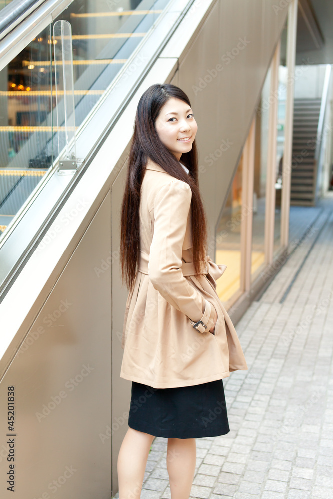 Beautiful business woman in the town. Portrait of asian. Beautiful business woman in the town. Portrait of asian.