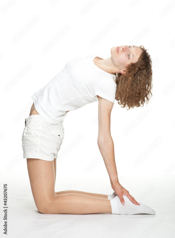 Attractive young woman doing sport exercises Attractive young woman doing sport exercises