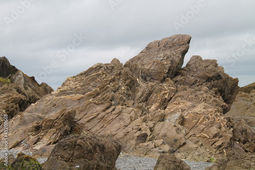 Εκτύπωση καμβά A Dramatic Rocky Outcrop on a Coastal Beach.