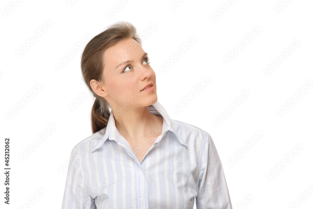 Portrait of a young business woman looking up Portrait of a young business woman looking up