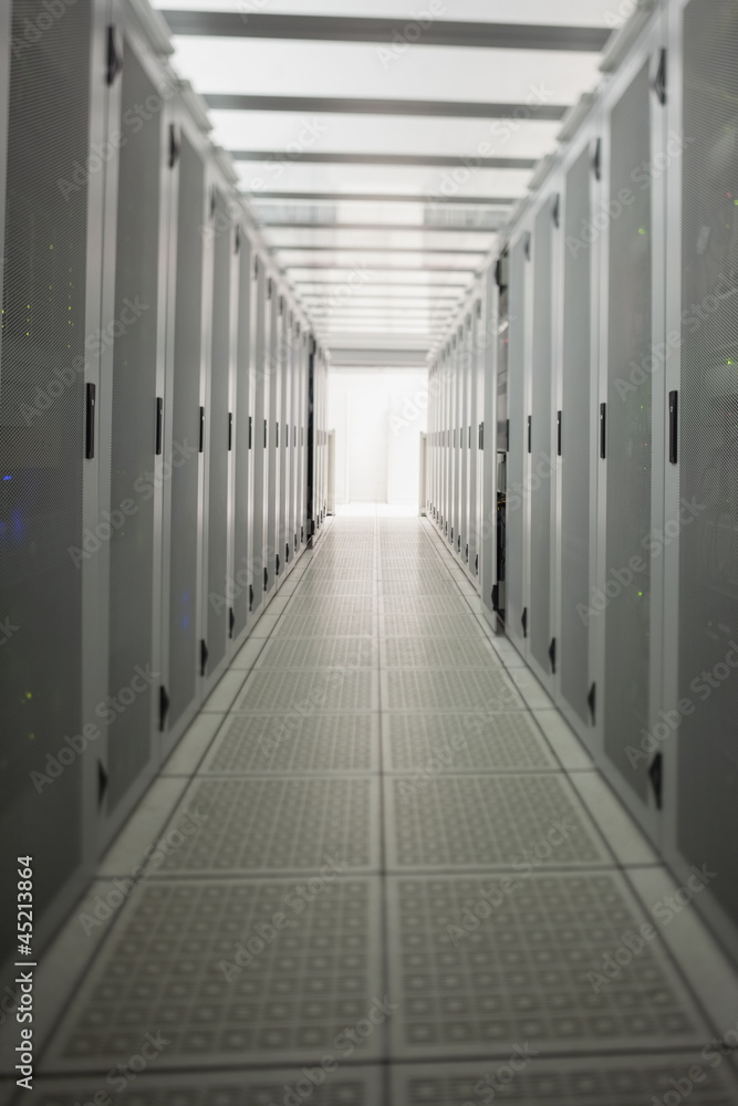 Hallway with a row of servers