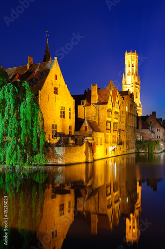 View from the Rozenhoedkaai of the Old Town of Bruges at dusk