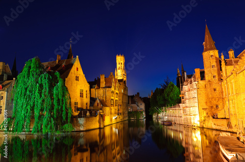 View from the Rozenhoedkaai of the Old Town of Bruges at dusk