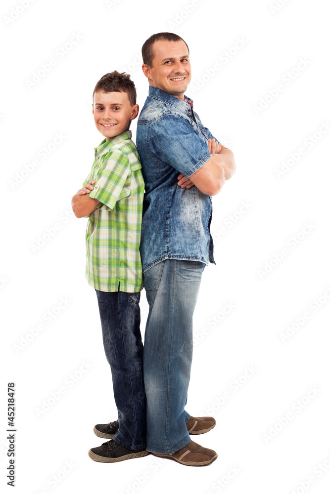 Father and son standing back to back, isolated on white Father and son standing back to back, isolated on white
