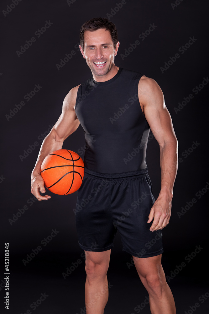 Young Man Holding Basketball