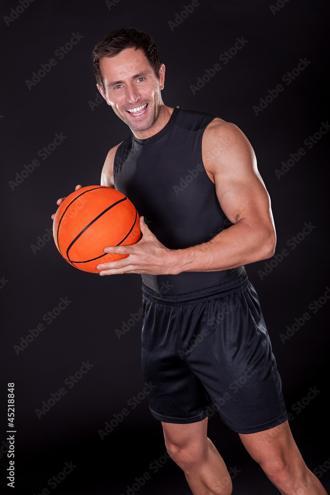 Young Man Holding Basketball