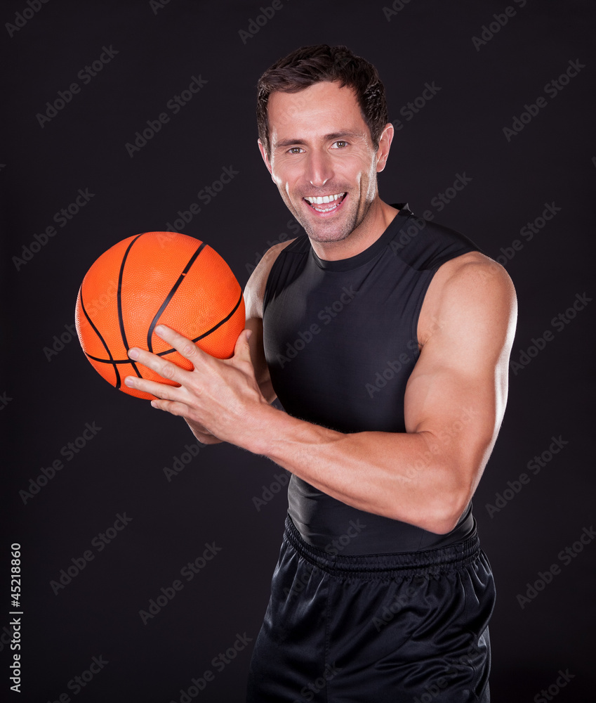 Young Man Holding Basketball