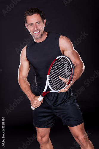 Young Man With Tennis Racket © Andrey Popov