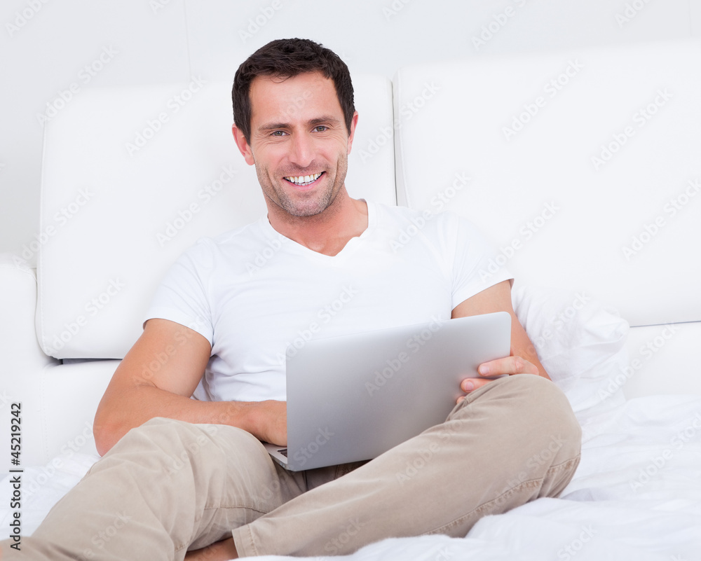 Portrait Of Young Man With Laptop Portrait Of Young Man With Laptop