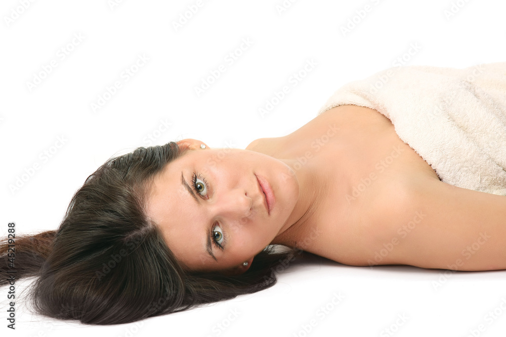 A beautiful woman lying on the floor A beautiful woman lying on the floor