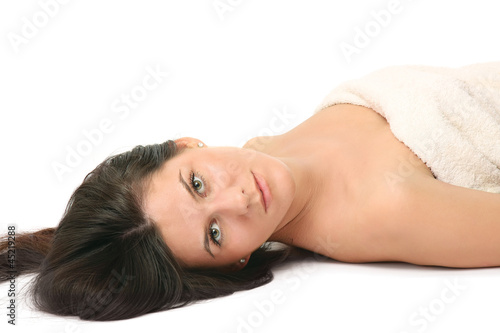 A beautiful woman lying on the floor