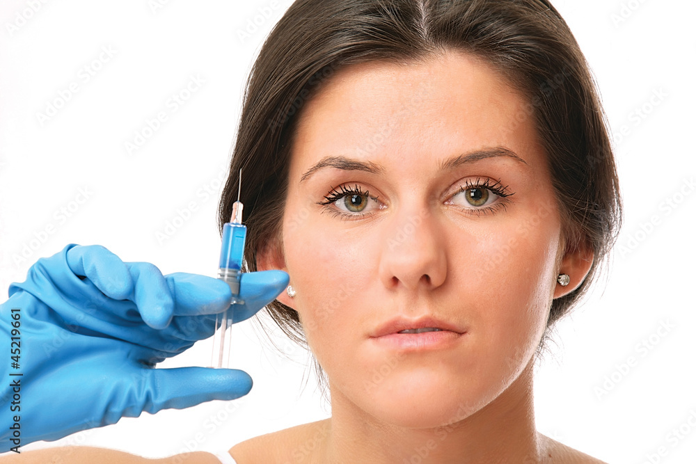Woman having an injection Woman having an injection