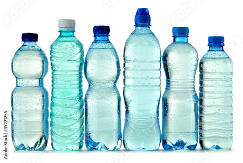 Polycarbonate plastic bottle of mineral water isolated on white