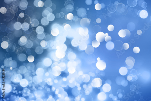 Abstract blue and white bokeh background