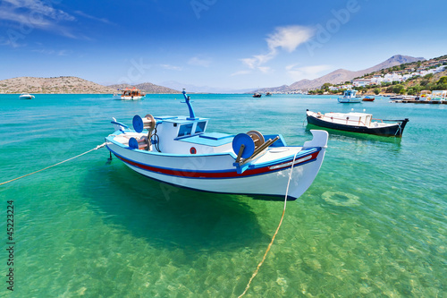 Fishing boats at the coast of Crete, Greece © Patryk Kosmider