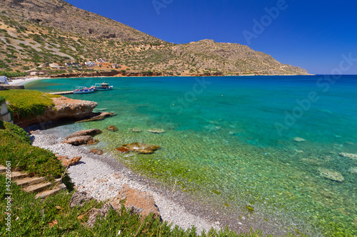 Turquise water of Mirabello bay in Plaka town on Crete, Greece © Patryk Kosmider