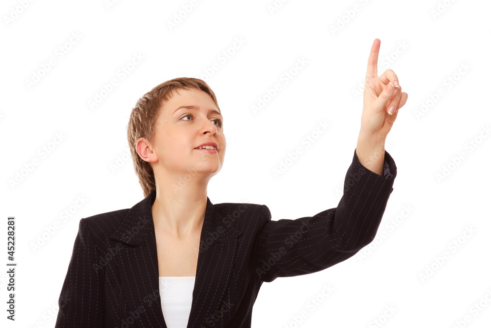 A beautiful businesswoman pointing at something A beautiful businesswoman pointing at something