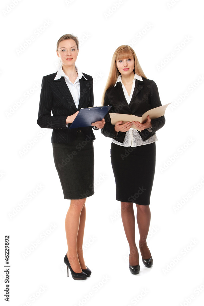 A full-length portrait of successful businesswomen