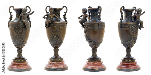 Two antique bronze vases with angel figure.