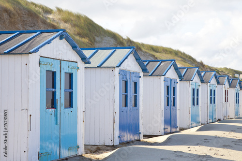 Dutch little houses on beach in De Koog Texel, The Netherlands