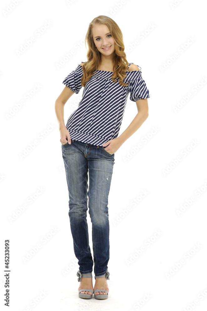 Full length beautiful fashion woman in blue jeans posing Full length beautiful fashion woman in blue jeans posing