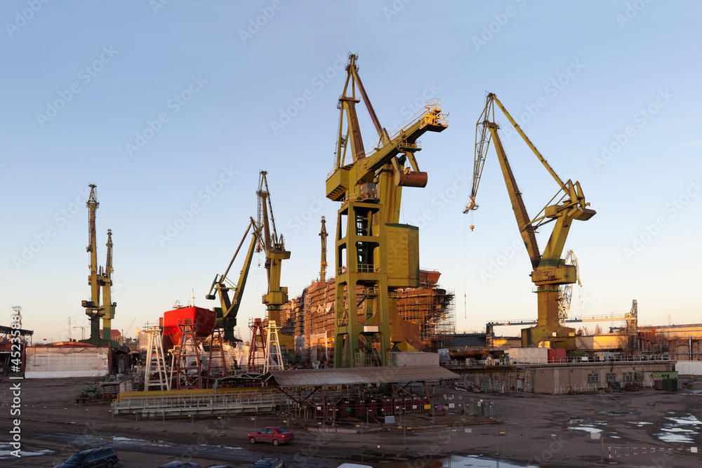Fototapeta premium Monumental shipyard cranes in Gdansk, Poland.