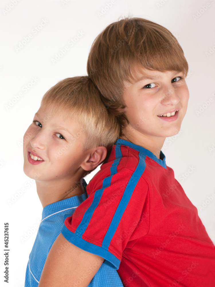 Two funny children isolated on white background Two funny children isolated on white background