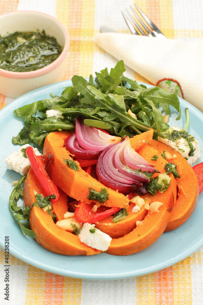 Pumpkin salad with arugula, parmesan and pesto Pumpkin salad with arugula, parmesan and pesto