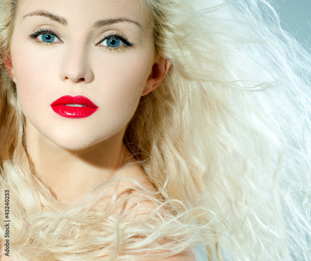 beautiful blonde, heavily madeup red lipstick