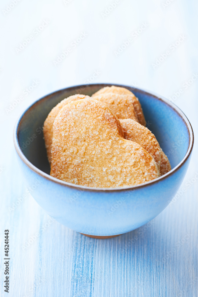 Butter cookies with sugar in a ceramic bowl