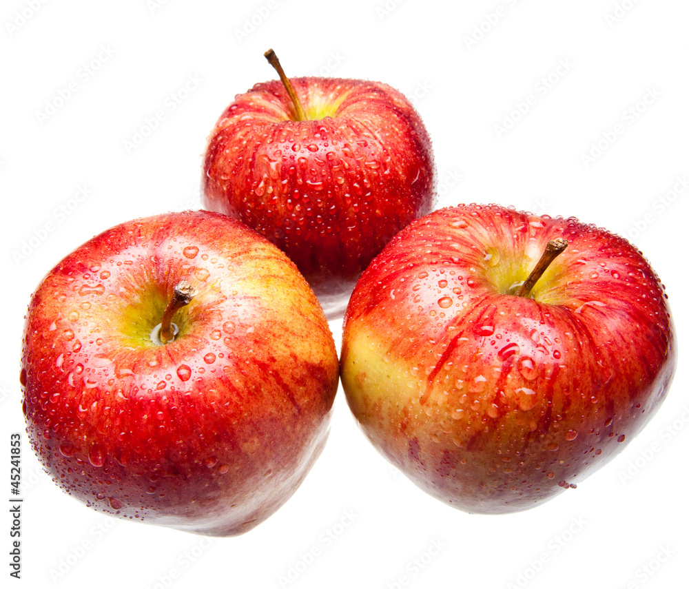 Three juicy apples lay on white background Three juicy apples lay on white background