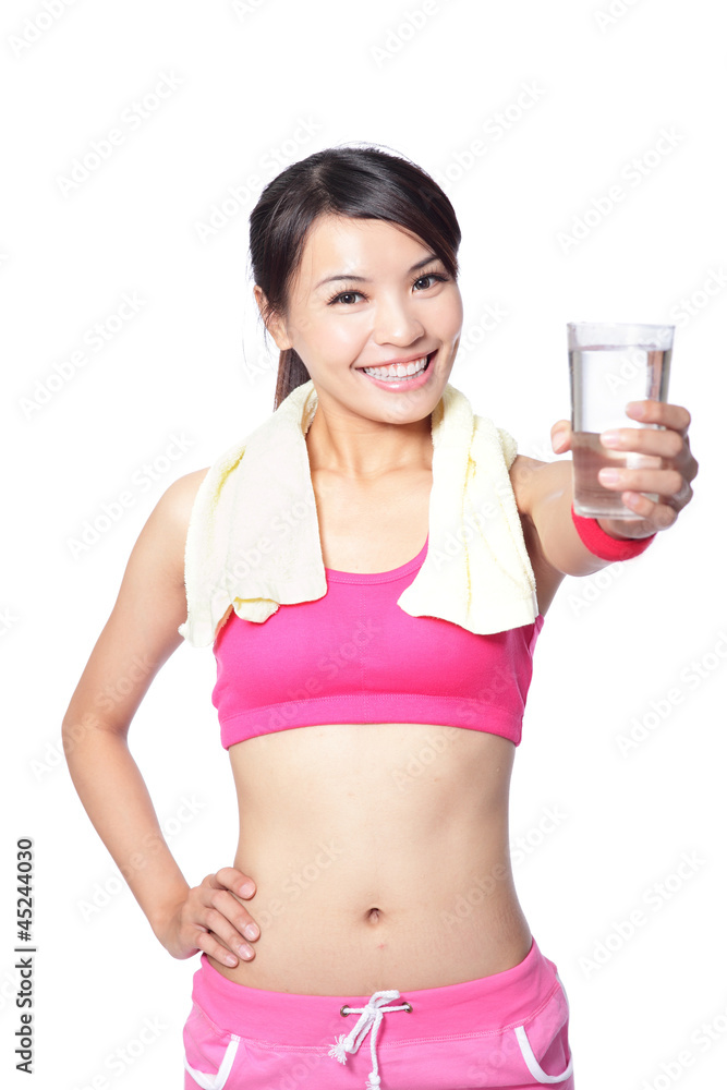 Smiling young woman with water after sport Smiling young woman with water after sport