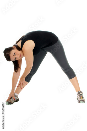 sporty young woman doing gymnastics