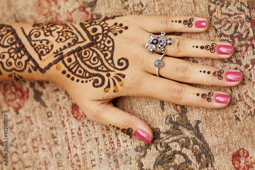 Henna art on woman's hand