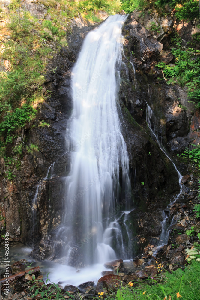waterfall in Val di sole, Italy waterfall in Val di sole, Italy