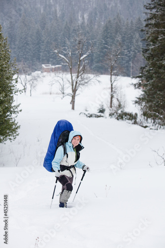 Hiker in winter mountains