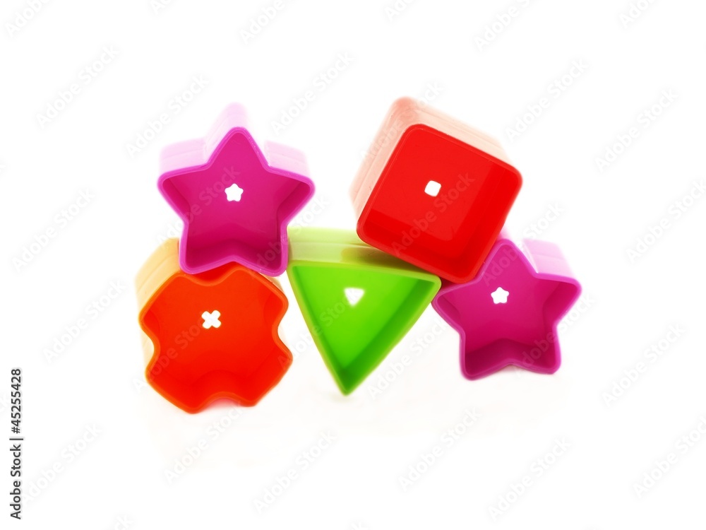 Shapes of plastic, toys for kids, isolated towards white Shapes of plastic, toys for kids, isolated towards white