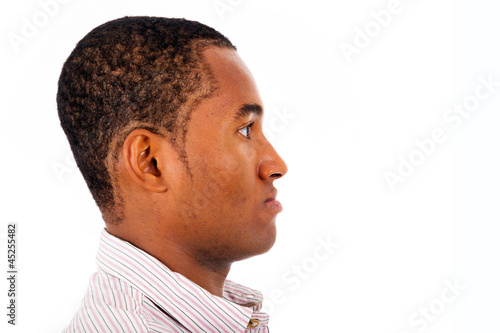Young black man profile face over white background. Space to ins