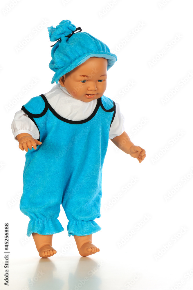 Baby doll with blue dress isolated white bacground Baby doll with blue dress isolated white bacground