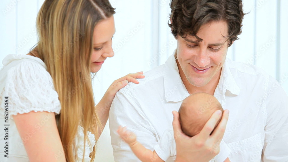 Close Up Contented Parents and Baby Close Up Contented Parents and Baby