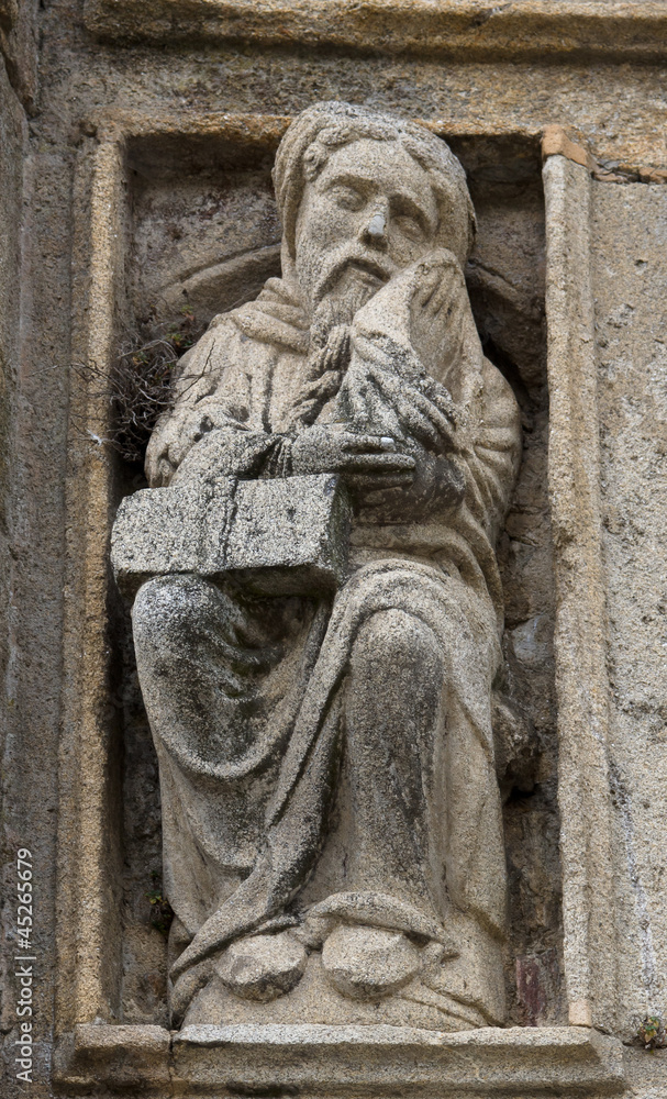 Romanesque old man in Holy Portal in Santiago