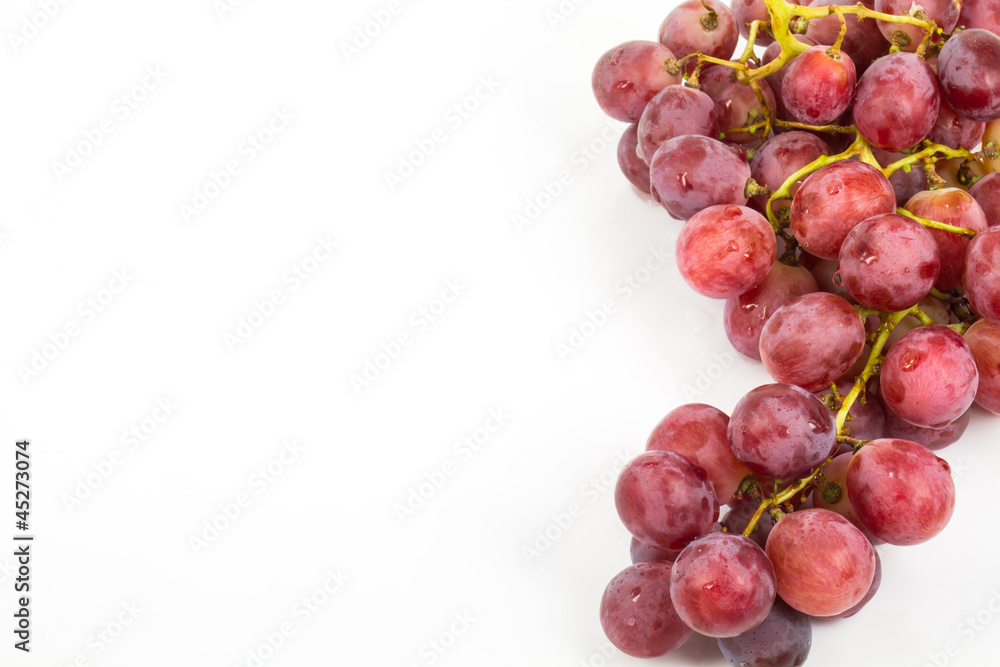 Fototapeta premium red grape isolated on white
